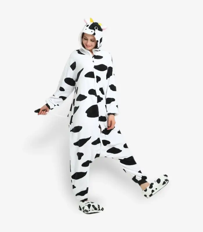 funny-cow-pajamas-costume Woman modeling a comfortable adult cow onesie pajama costume.