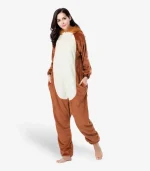 Full body shot of a woman with her hands in the pockets of her warm lion loungewear.