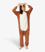 playfully posing with her hands near the hood of her cozy Lion Pajamas.