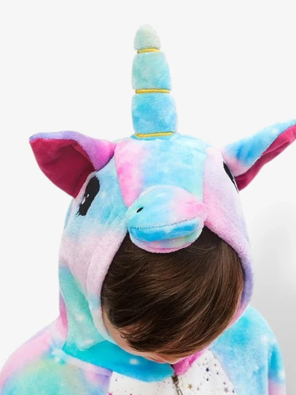 Close-up of a plush children's kigurumi hood detailing a soft blue horn, pink ears, and embroidered eyes.