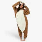 Woman wearing the comfortable brown Sloth Onesie for Adults pajama costume.