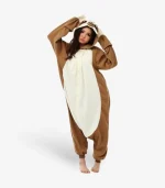 Woman wearing the comfortable brown Sloth Onesie for Adults pajama costume.