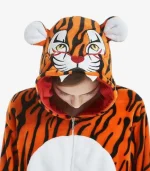 Close-up of the Tiger Onesie for Adults featuring a detailed hood with eyes, ears, and plush teeth.