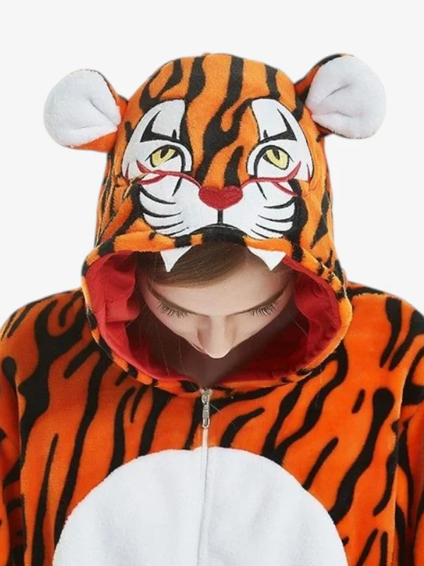 Close-up of the Tiger Onesie for Adults featuring a detailed hood with eyes, ears, and plush teeth.